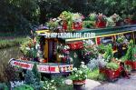 ID 1124 IPSWICH - a flower-adorned narrowboat laying alongside the Oxford Canal near Upper Fisher Row, Oxford, England.